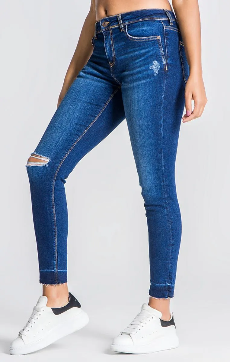 Blue Jeans With Ripped Hem